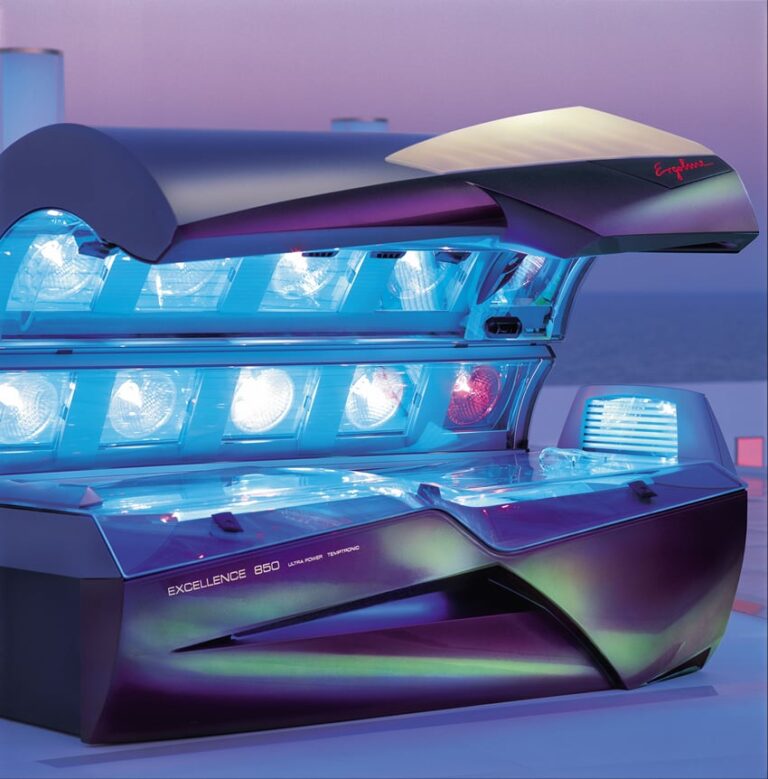 Blue-lit tanning bed at Advanced Tanning